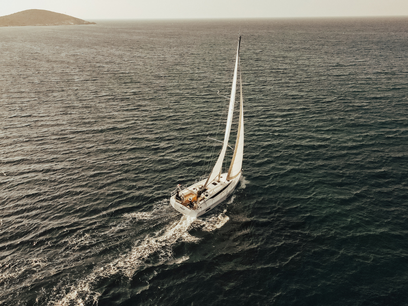 White sailboat sailing on sea dcaa accounting services