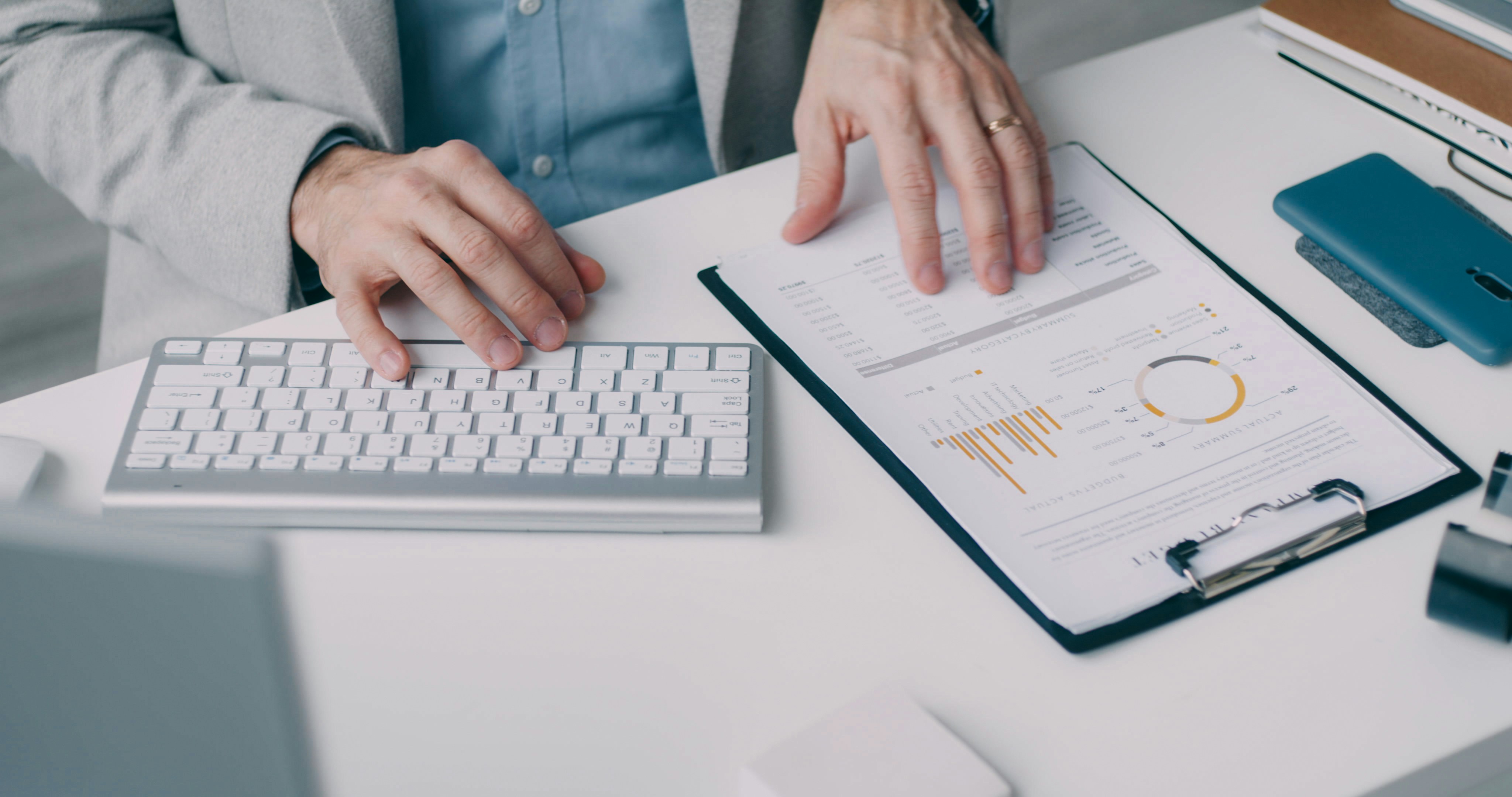 Person inputting data from chart to demonstrate single audit preparation